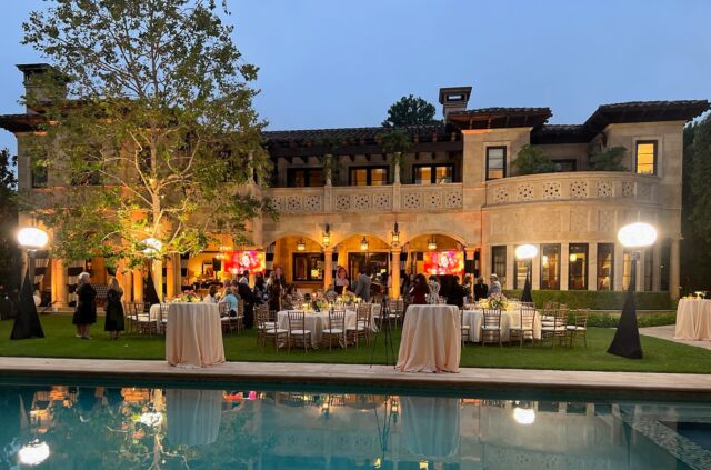 Outdoor garden party at a Mediterranean mansion