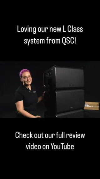 Samson team member with a QSC L Class speaker