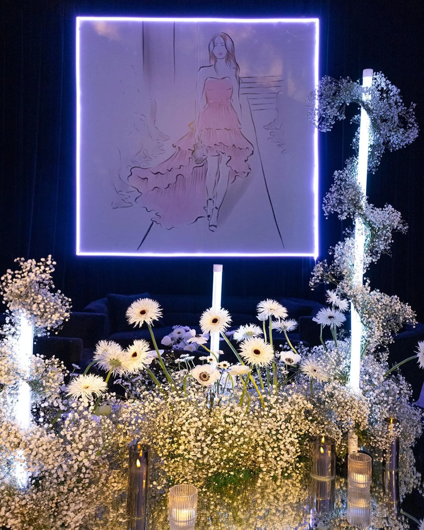Elegant florals — fashion-sketch neon backdrop with baby's breath and gerbera daisies