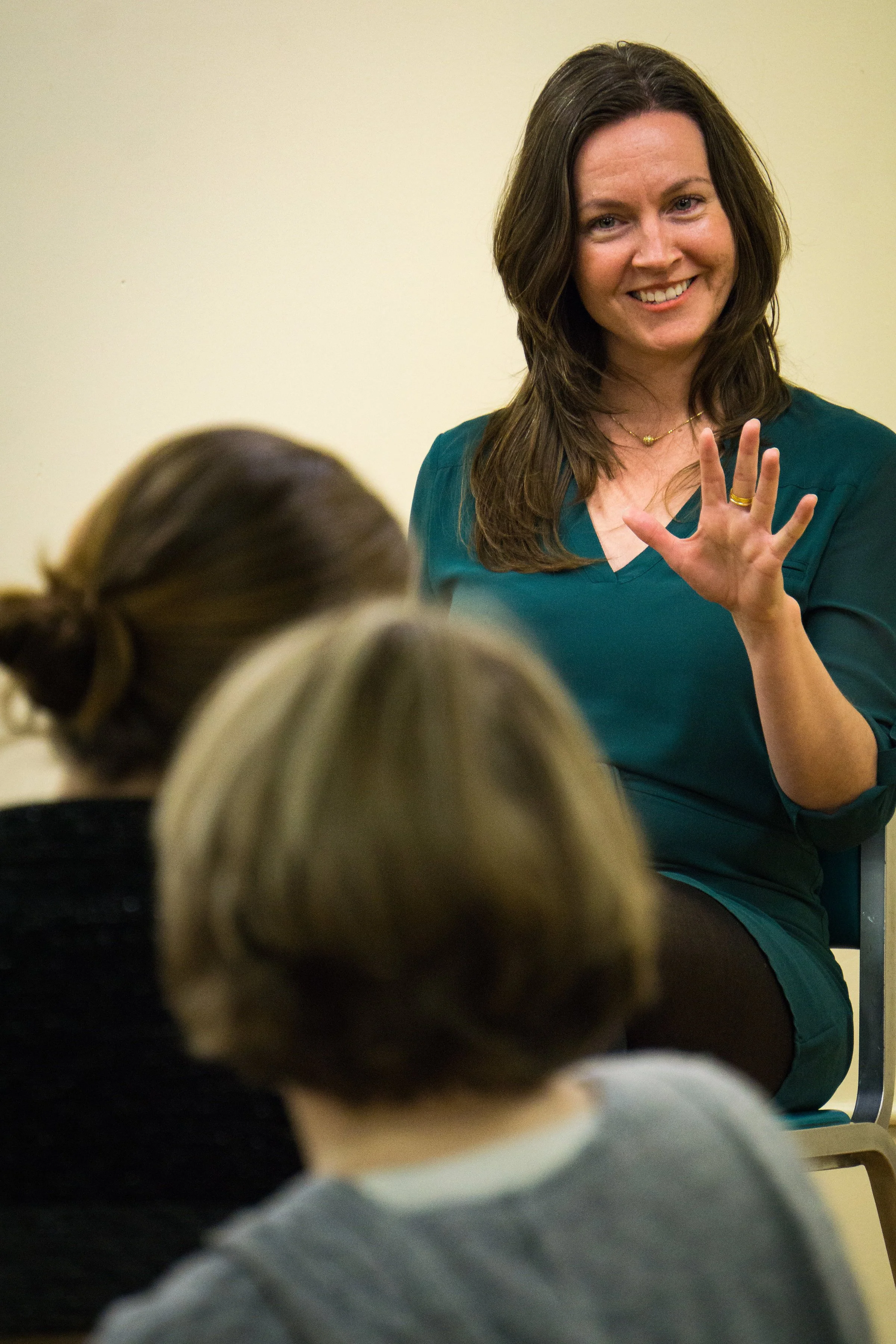 Lauren Polly leading a workshop on creativity, communication, and authentic self-expression.