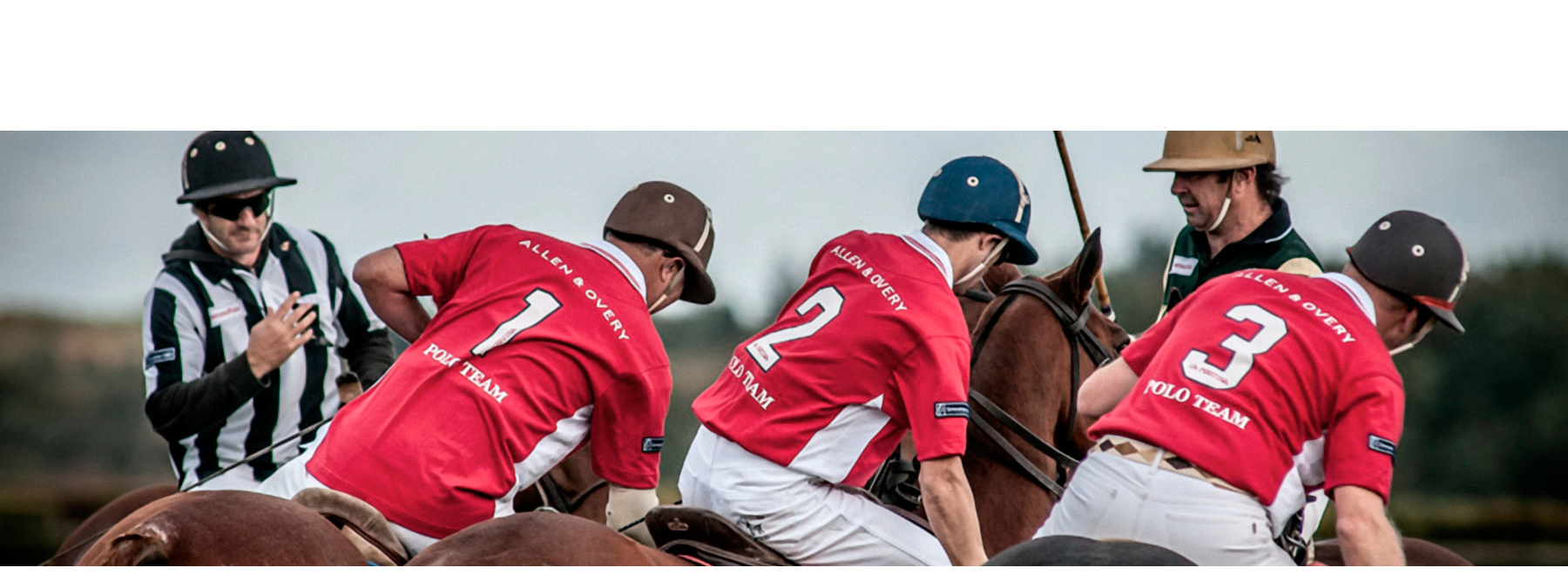Allen & Overy Polo Team riders huddled on horseback with the referee at left