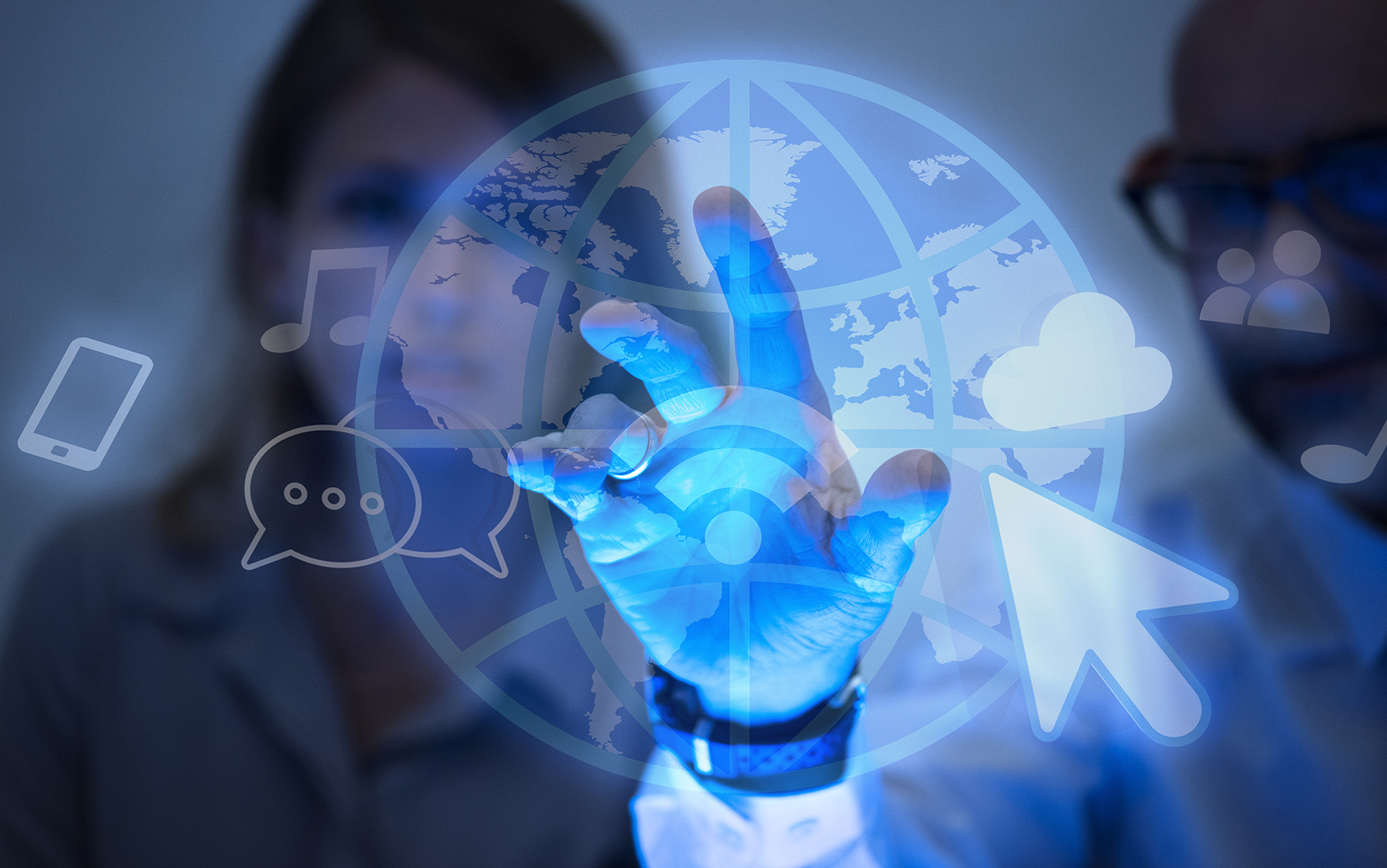 A hand touching a glowing digital globe surrounded by connectivity icons