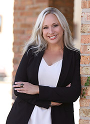 Portrait of Tracy Minnec, founder of Light Bulb Effects Coaching
