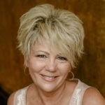Dr. Linda Shell, smiling headshot