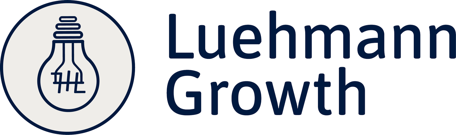 Luehmann Growth logo — a light bulb in a circle beside the Luehmann Growth wordmark