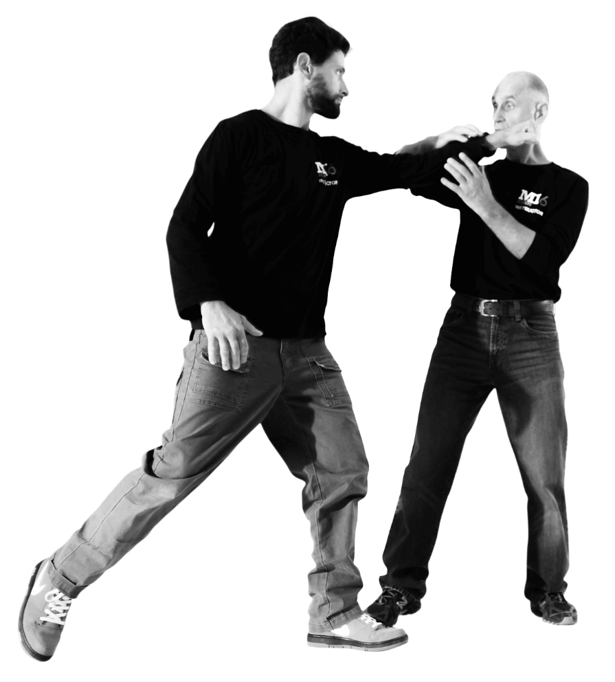 Two MI6 Academy instructors mid-strike during tactical training