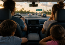 Family driving on a Florida highway at sunset