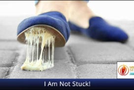 Shoe sole stepping on chewing gum on cobblestone