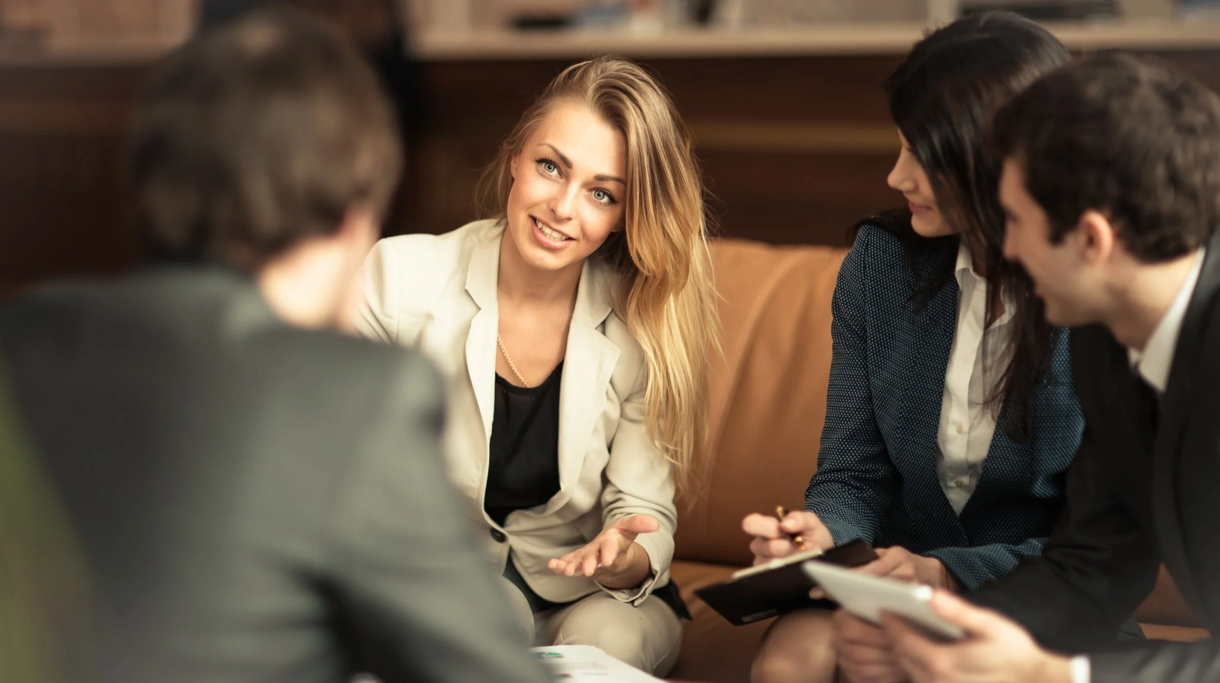 A consultant leading a strategy discussion with a leadership team
