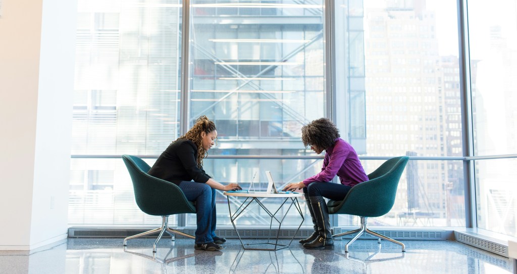 Two people in a work conversation