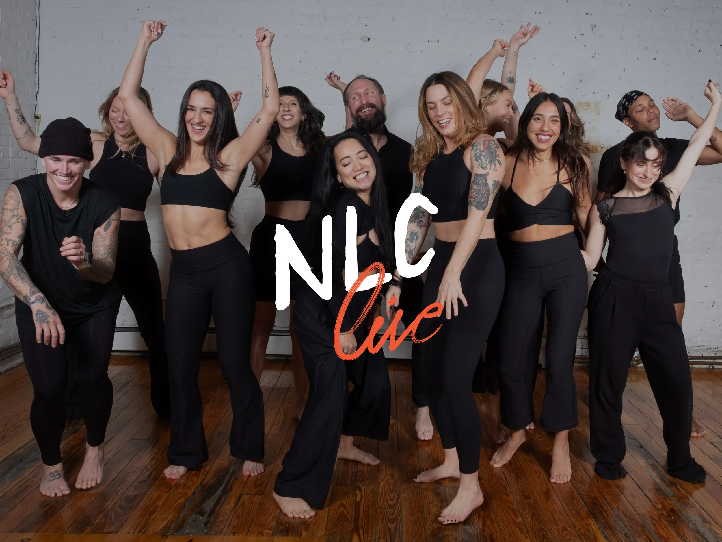 The full New Love City teaching team celebrating in the studio with an NLC Live text overlay