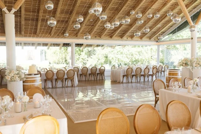 Overhead view of a reception with globe lights and a dance floor
