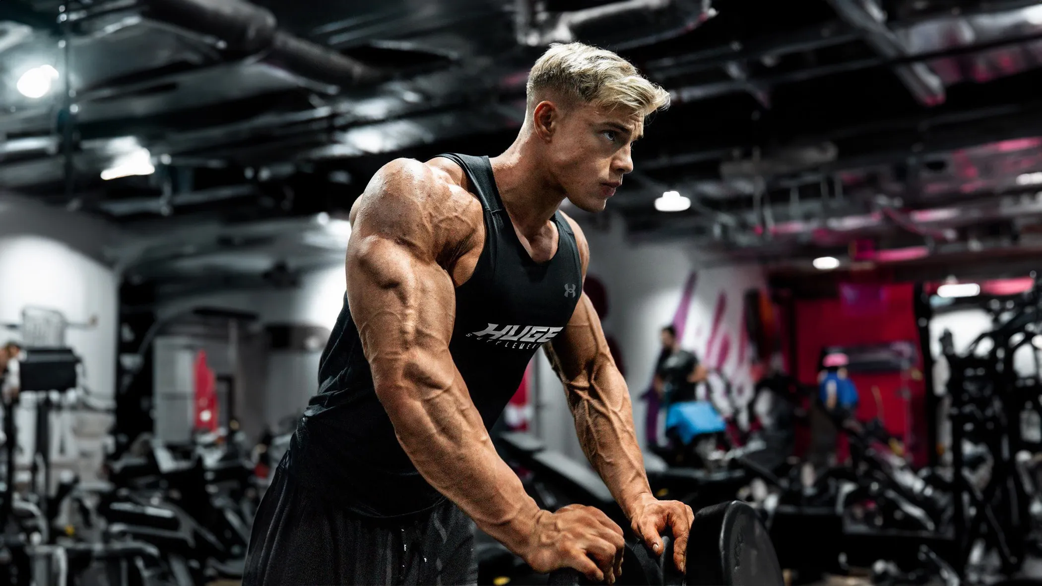 Creator doing dumbbell rows