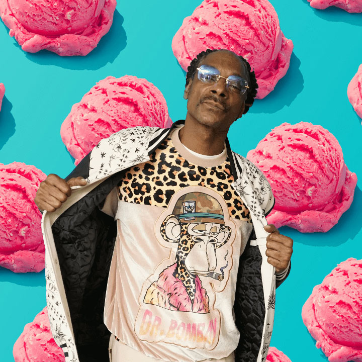 Snoop Dogg in a leopard-print jacket and graphic tee in front of giant pink ice cream scoops on a teal background