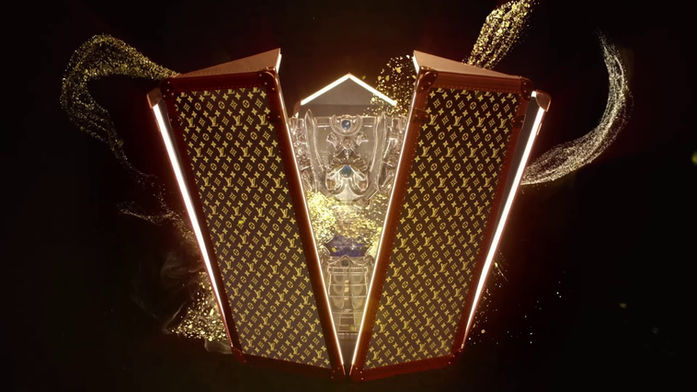 Louis Vuitton trophy case open to reveal the League of Legends Summoner's Cup