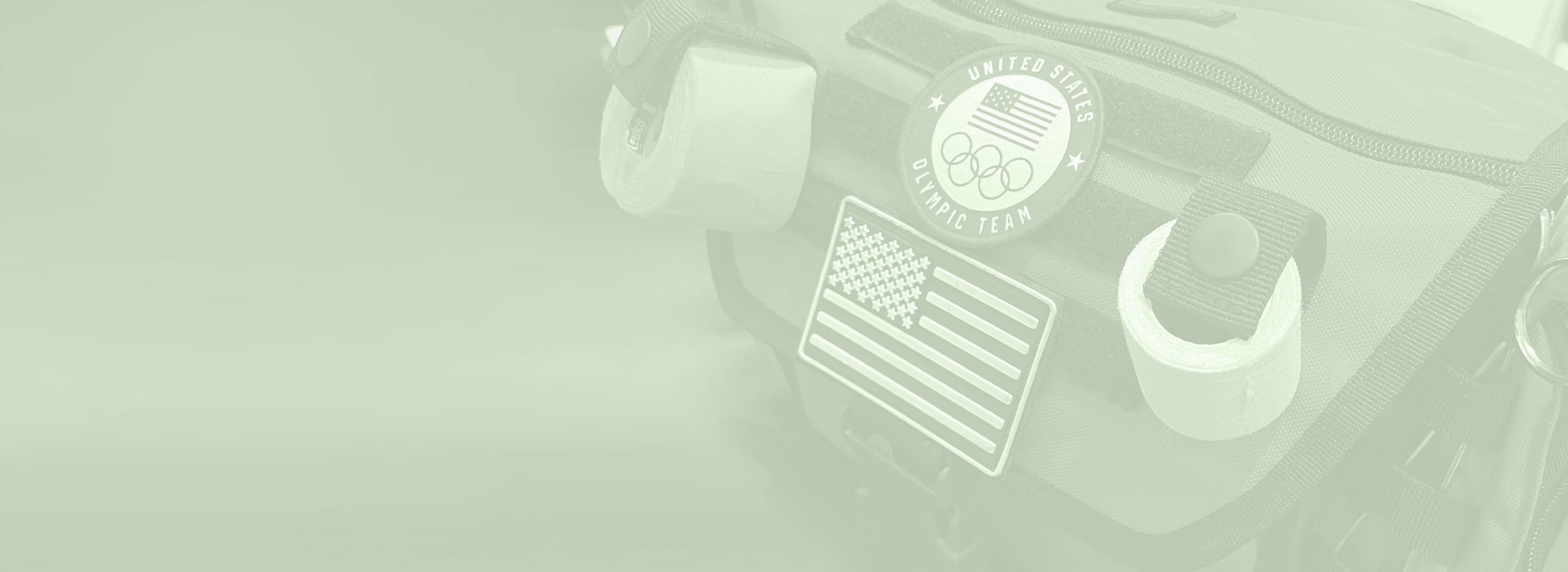 Close-up of a sports medical bag with US Olympic Team and American flag patches