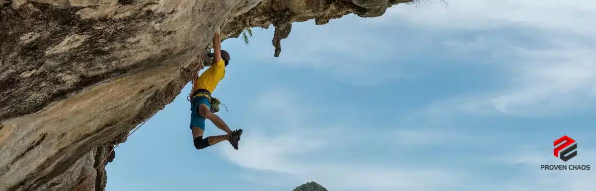 Rock climber on an overhanging cliff face
