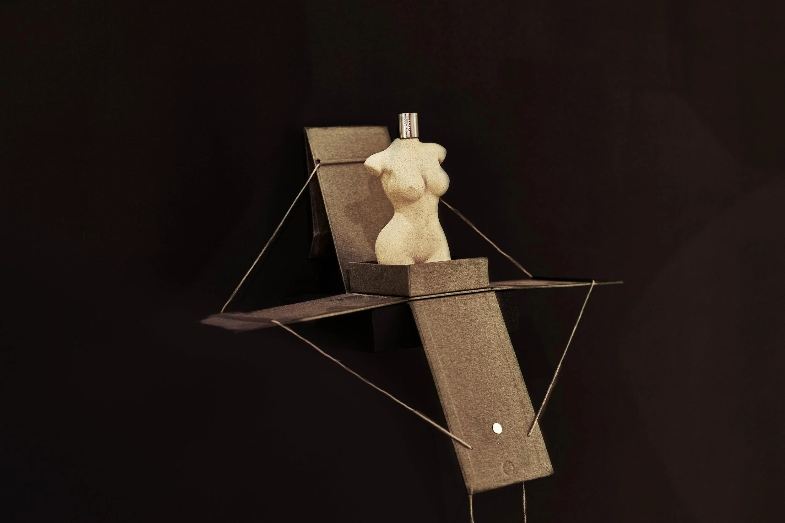 KKW Beauty torso-shaped perfume bottle on a geometric sculptural stand, Century City