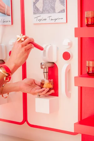 Josie Maran Malibu product dispenser activation close-up