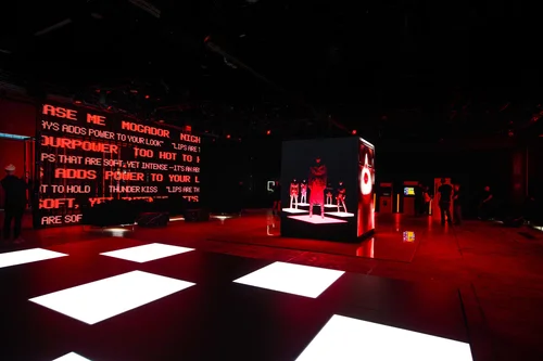 NARS Powermatte launch with an LED text wall and lit floor panels