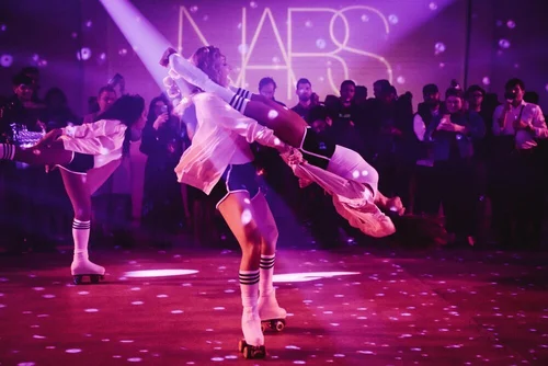 Roller derby acrobatic performers at the NARS Afterglow event