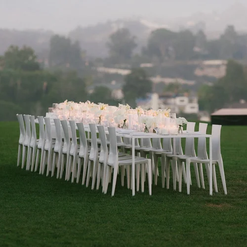 All-white NARS Soft Matte dinner table on a lawn