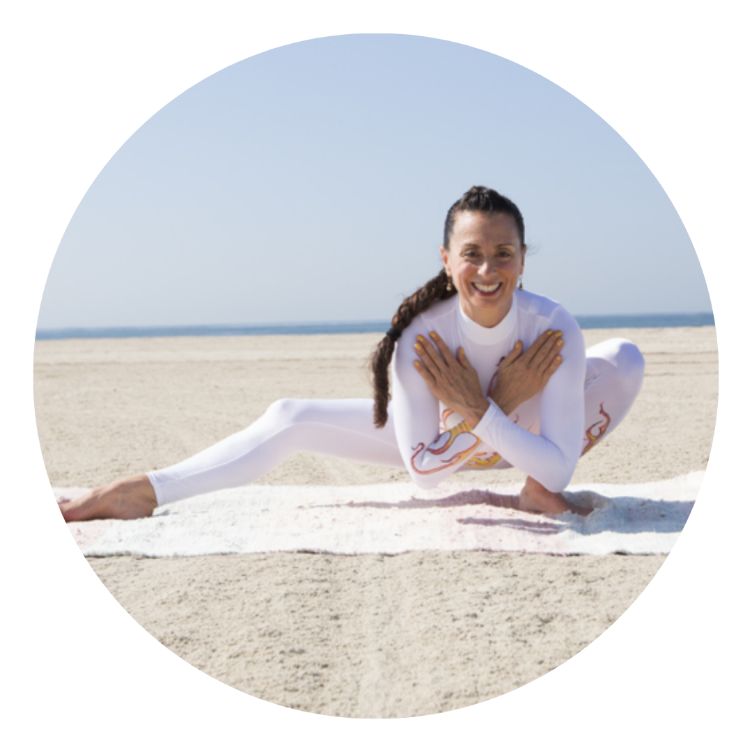 Pa'mela Carrara practicing yoga on the beach