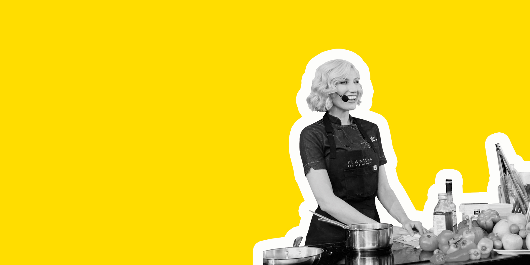 Black-and-white cut-out of a blonde chef cooking on stage at SEED, on bright yellow