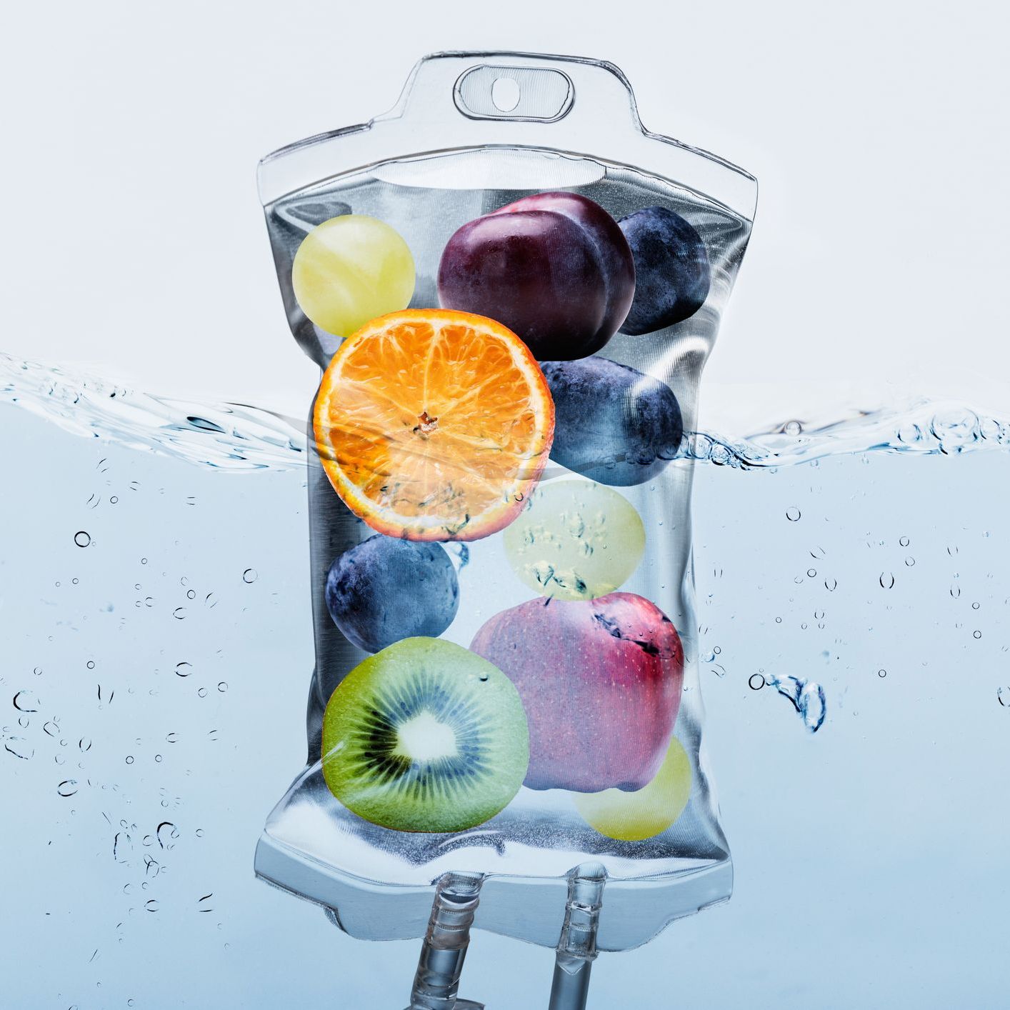 IV drip bag filled with colorful fruit submerged in water