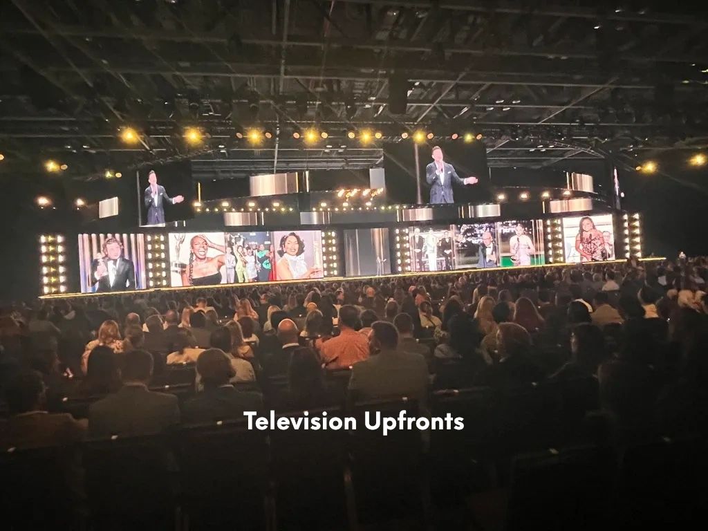 Television upfront event with a large LED stage and audience