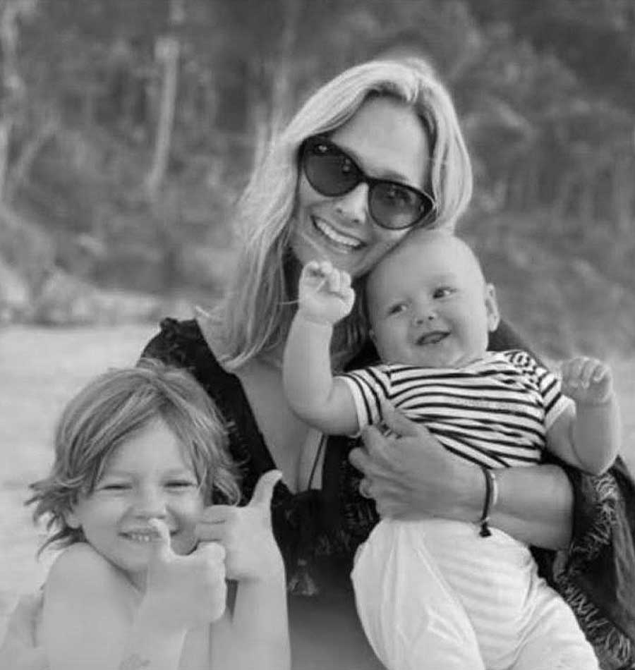 Emma Boutin holding a baby