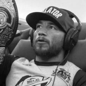 The Spaniard, MMA champion, holding a championship belt
