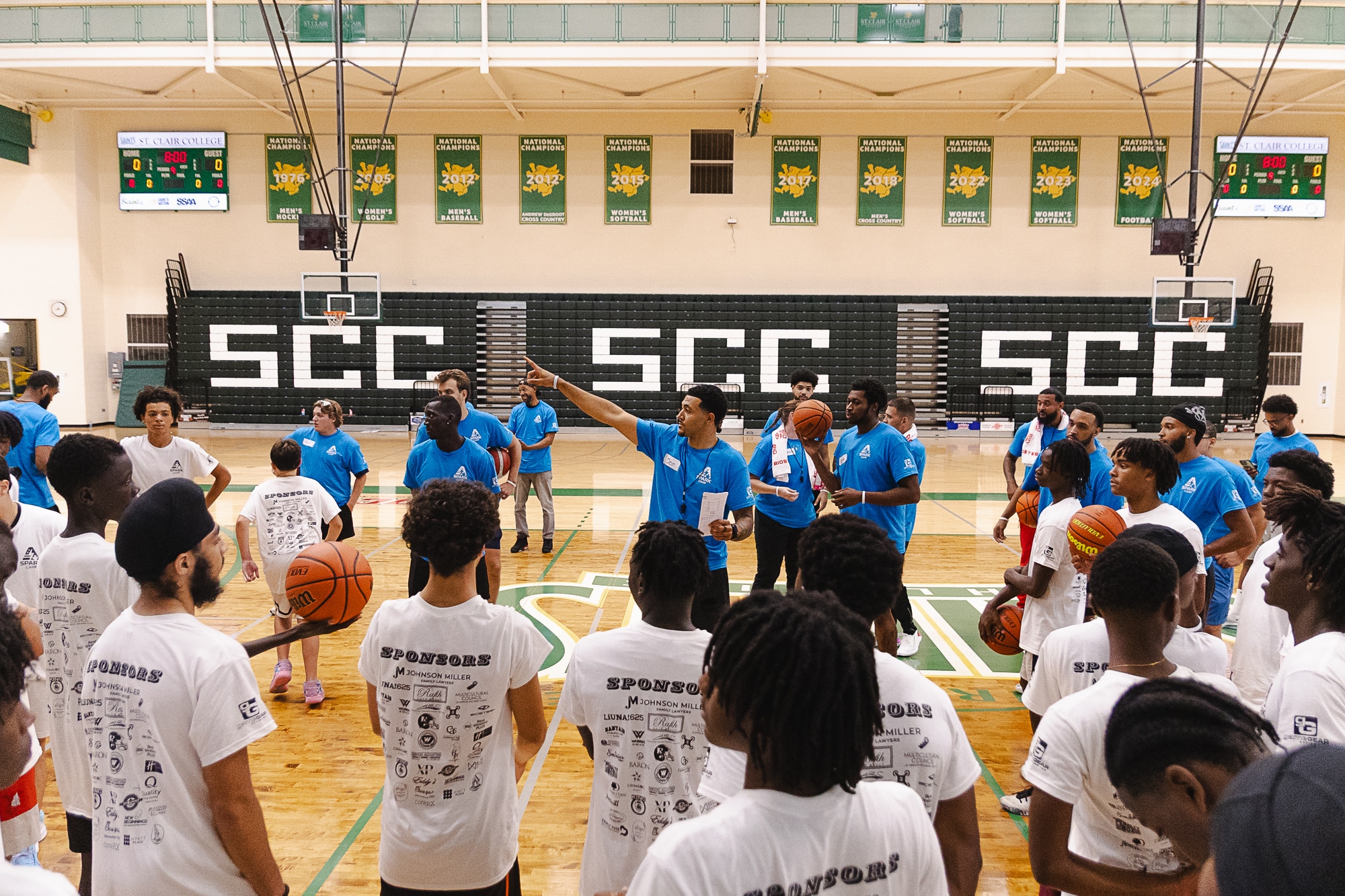 Coach addressing the whole camp at the SCC gym