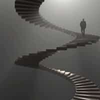 Lone figure atop a dramatic spiral staircase in fog