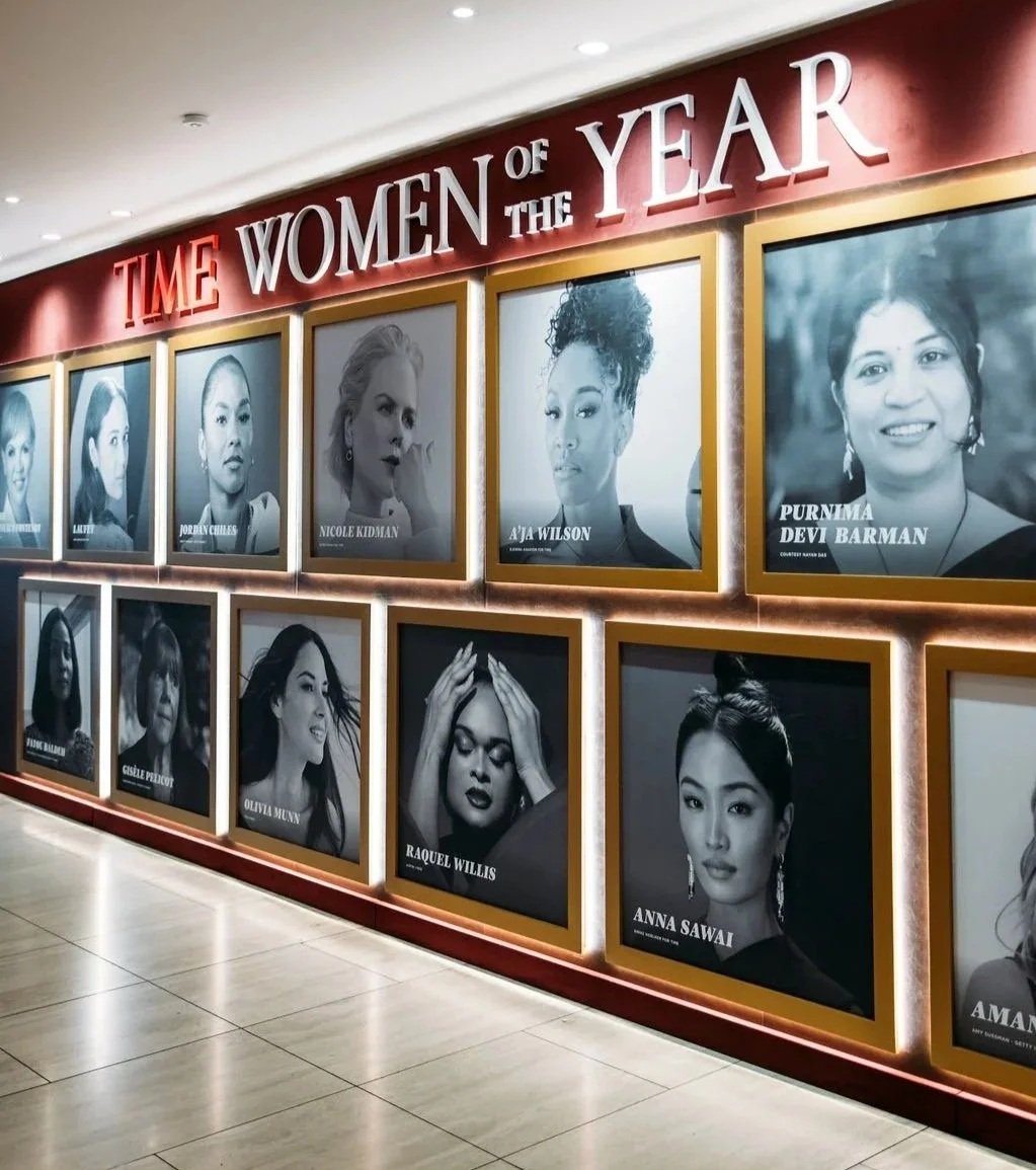 TIME Women of the Year illuminated gold-framed black-and-white portrait wall of honorees
