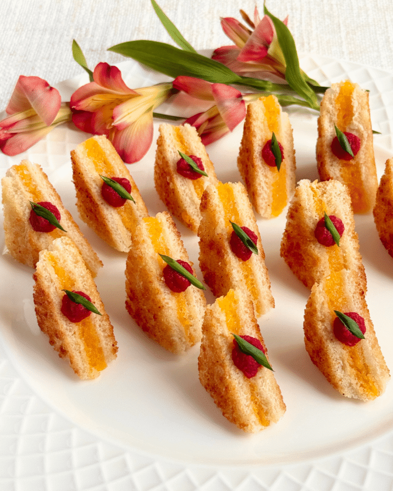 Grilled cheese soldiers with tomato and basil served at a corporate holiday party
