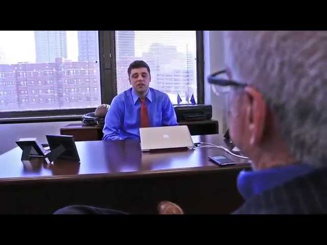 Paul Sylvester coaching two men in a business meeting
