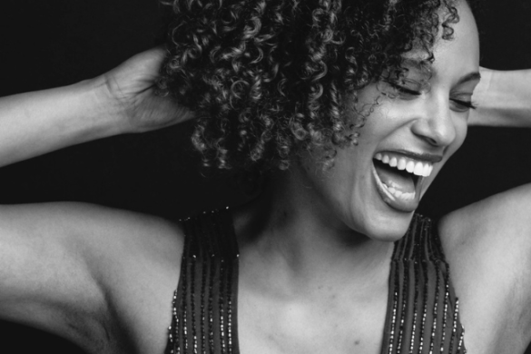 Black-and-white portrait of Rebecca L. Hargrove laughing