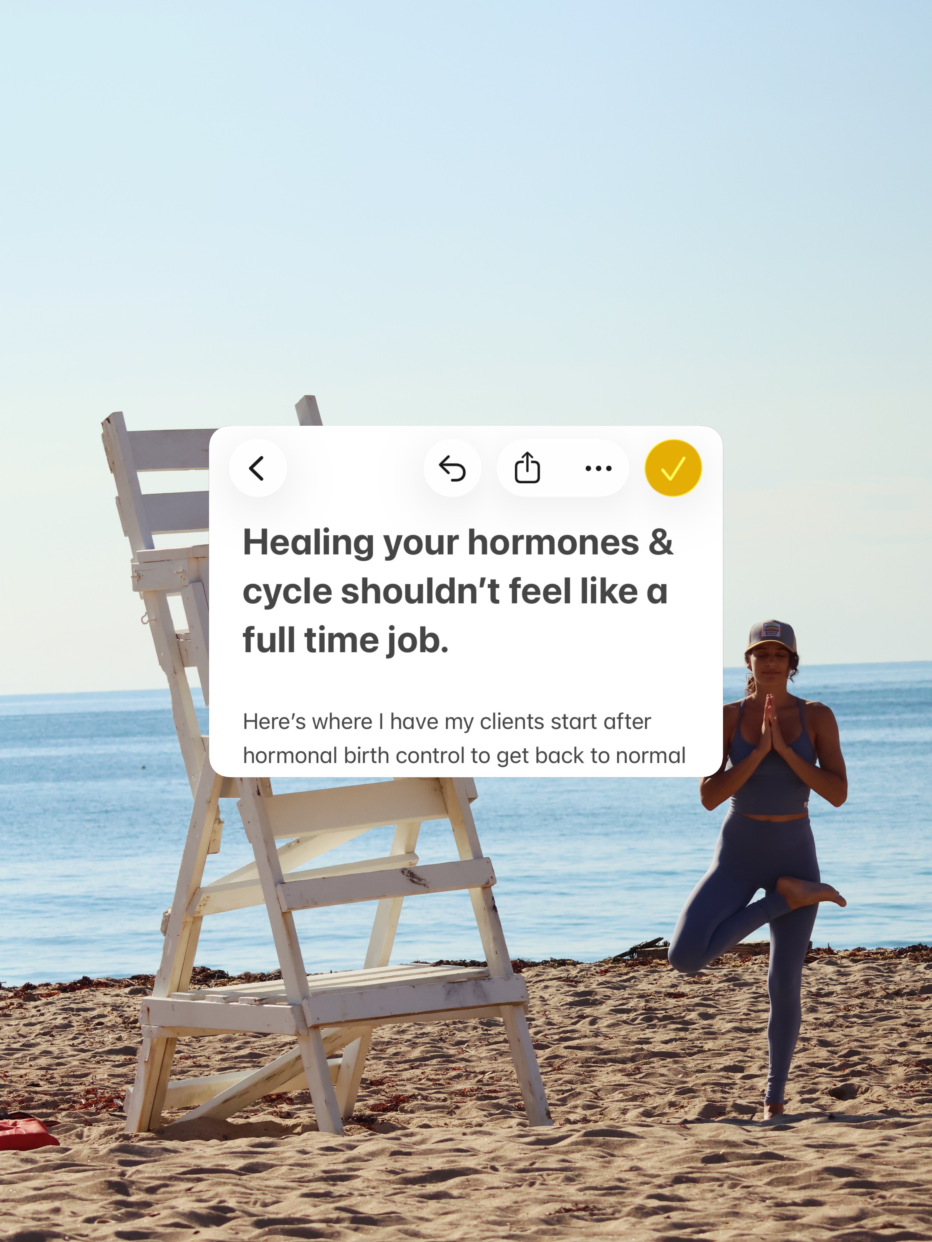Tree pose on a beach beside a lifeguard stand with a card reading healing your hormones shouldn't feel like a full time job