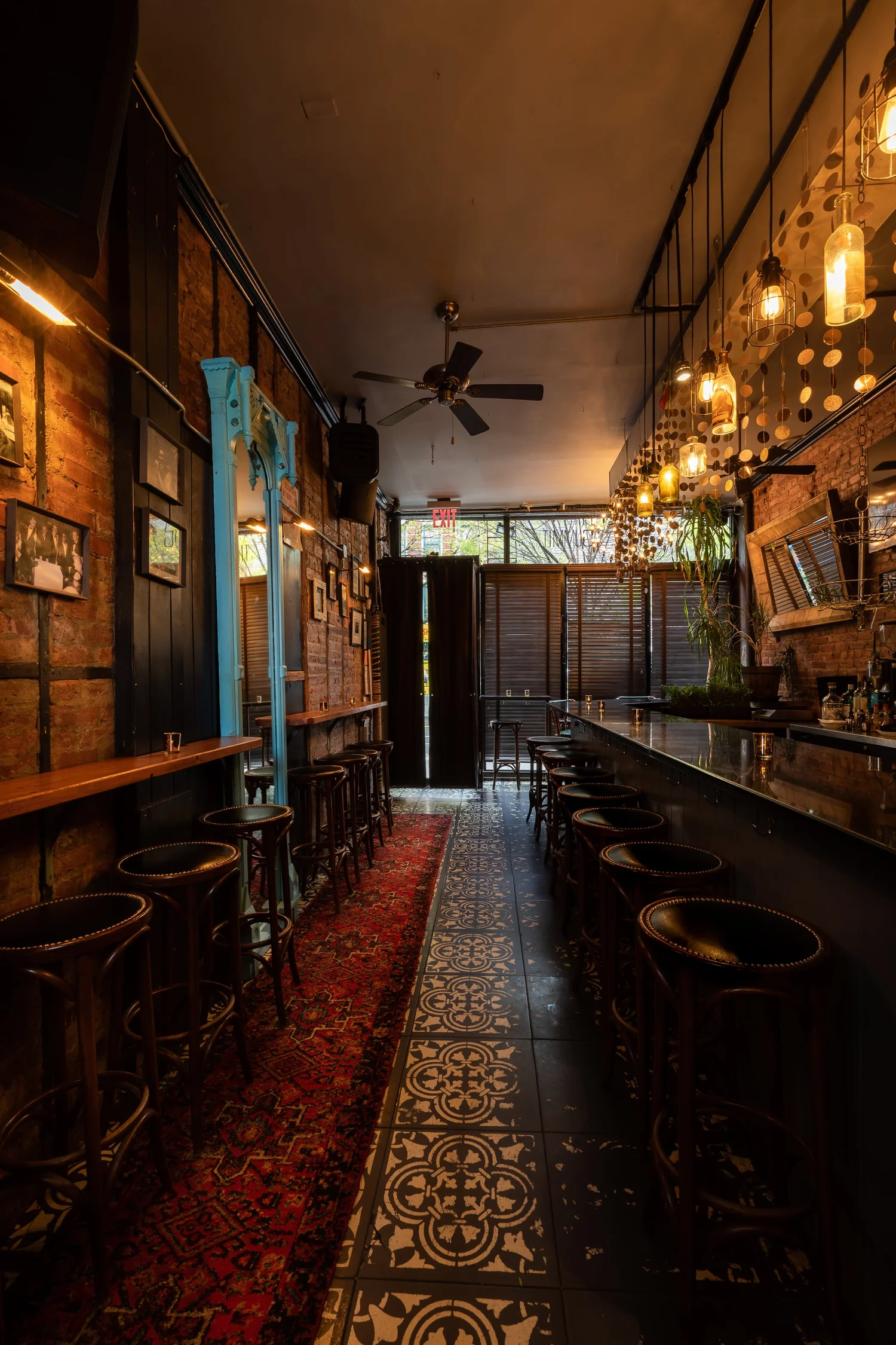 The Summit's low-lit bar room on Avenue C at night