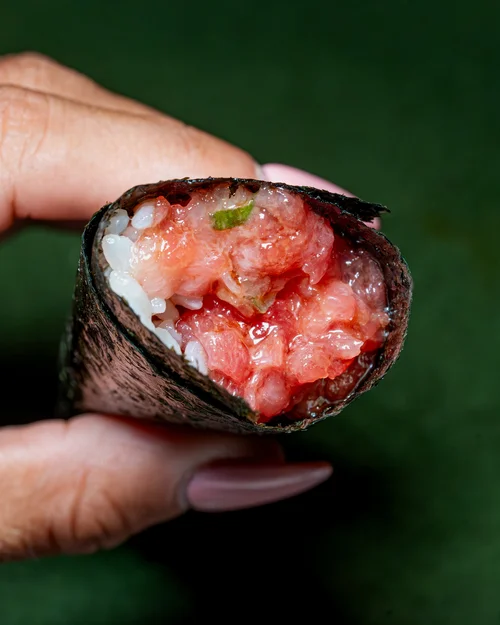Toro hand roll held in hand