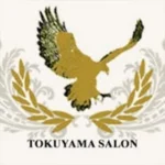 Tokuyama Salon golden eagle and laurel logo