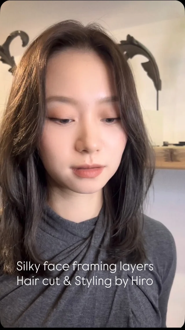 Client with silky face-framing layered haircut