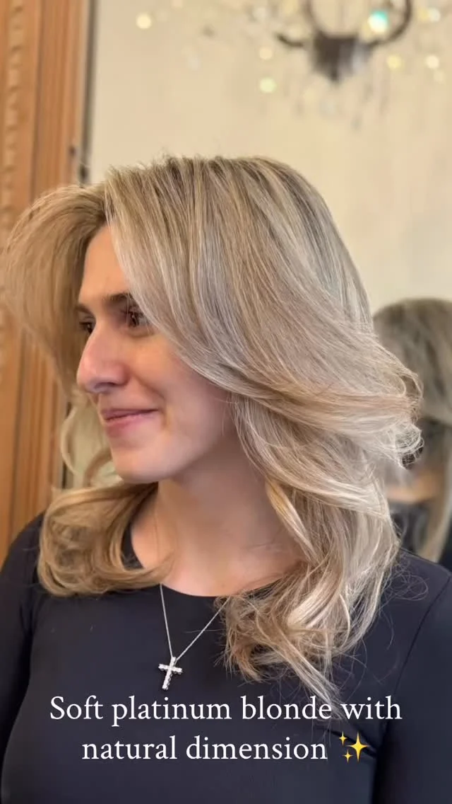 Client with soft platinum blonde hair with natural dimension