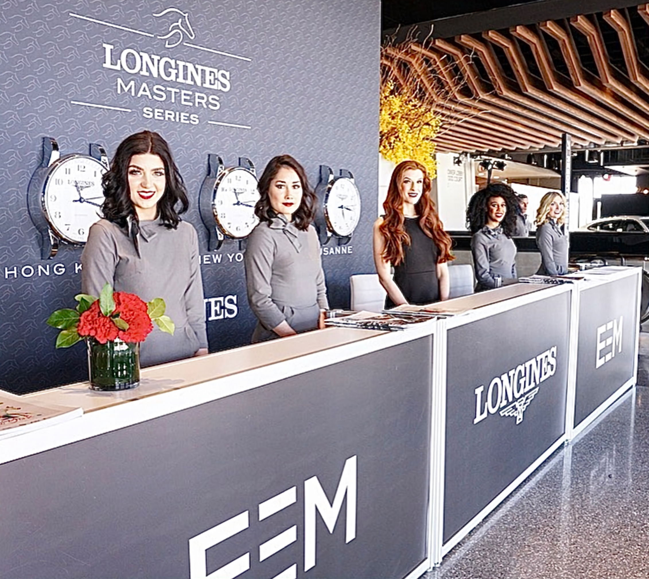 Brand ambassadors at a Longines Masters Series reception desk