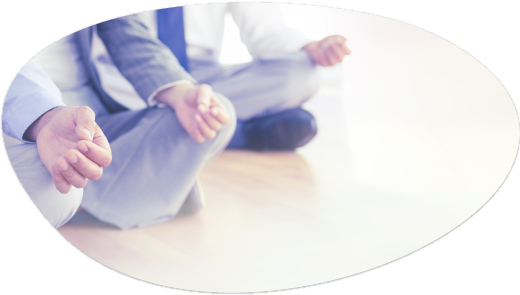 Person seated in a lotus meditation pose