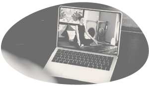 Laptop showing a live virtual yoga session