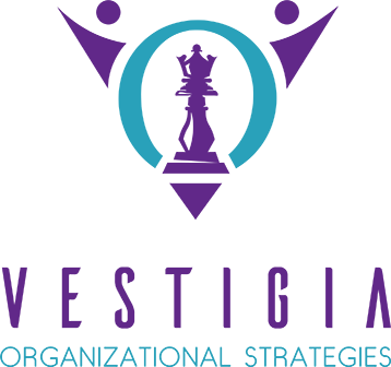 Vestigia Organizational Strategies logo — purple and teal chess queen wordmark