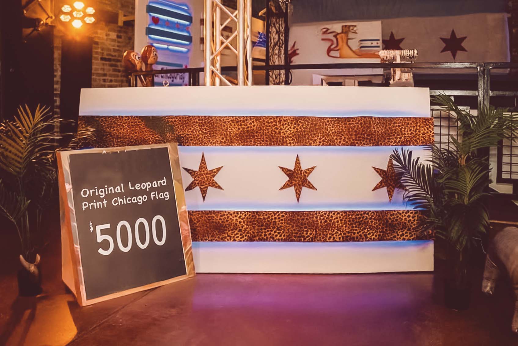 Leopard-print Chicago-flag art installation with a $5000 sign