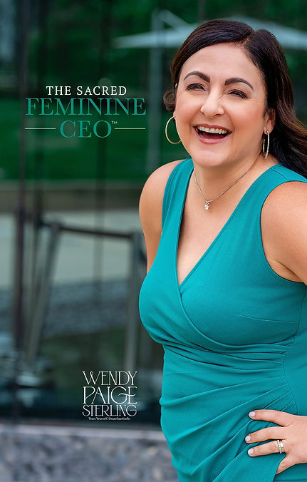 Wendy Paige Sterling laughing in a teal wrap dress — The Sacred Feminine CEO
